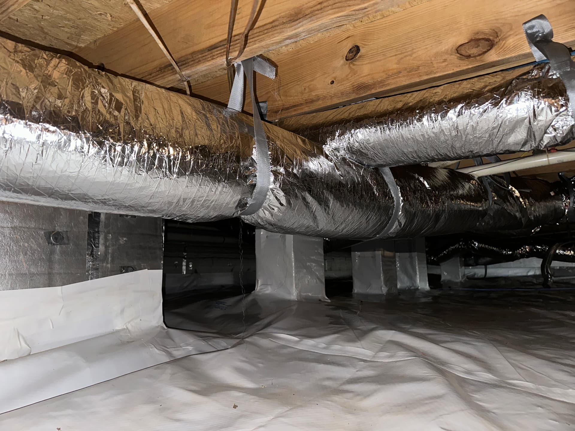 Full A/C System and Ductwork Replacement in a Crawl Space Home